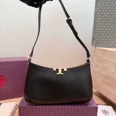 Toryburch's newest little gold brick armpit bag
