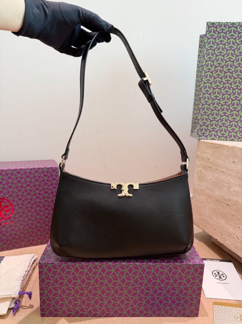 Toryburch's newest little gold brick armpit bag