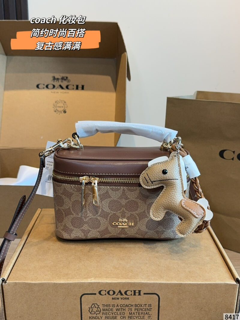 This Coach old flower box bag welds vintage sophistication directly to the body