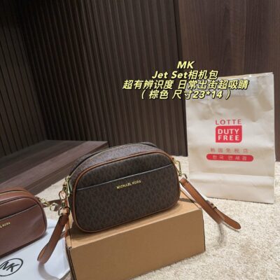 MK This Jet Set camera bag features a classic old-fashioned pattern