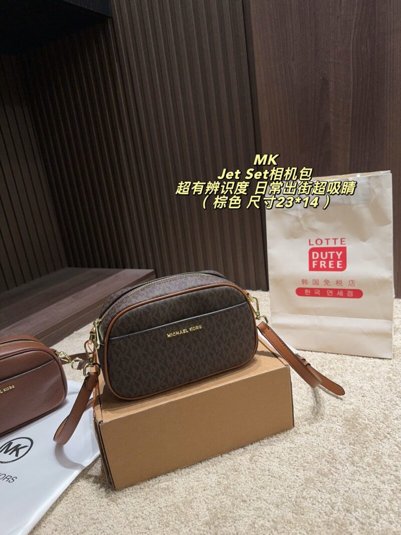 MK This Jet Set camera bag features a classic old-fashioned pattern