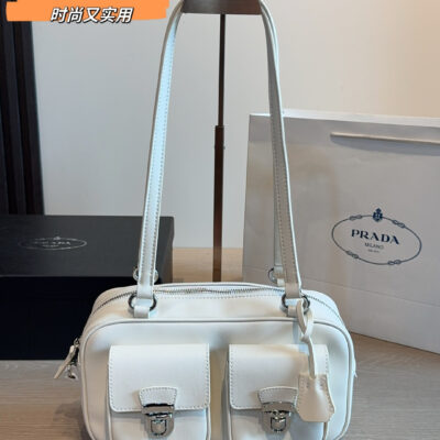 This is a Prada double pocket motorcycle bag (also known as a bowling bag/double purse)