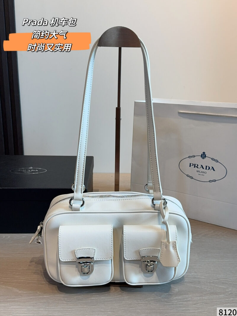 This is a Prada double pocket motorcycle bag (also known as a bowling bag/double purse)